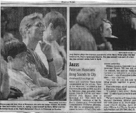 newspaper clipping with photo of audience members and Jody Espina and Harry Miller