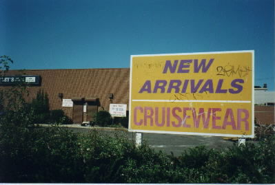 photo of the Shirley Building with billboard